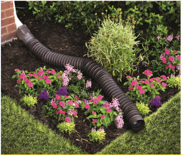 Garden with downspout extender