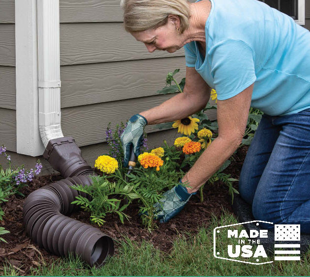 woman gardening with downspout